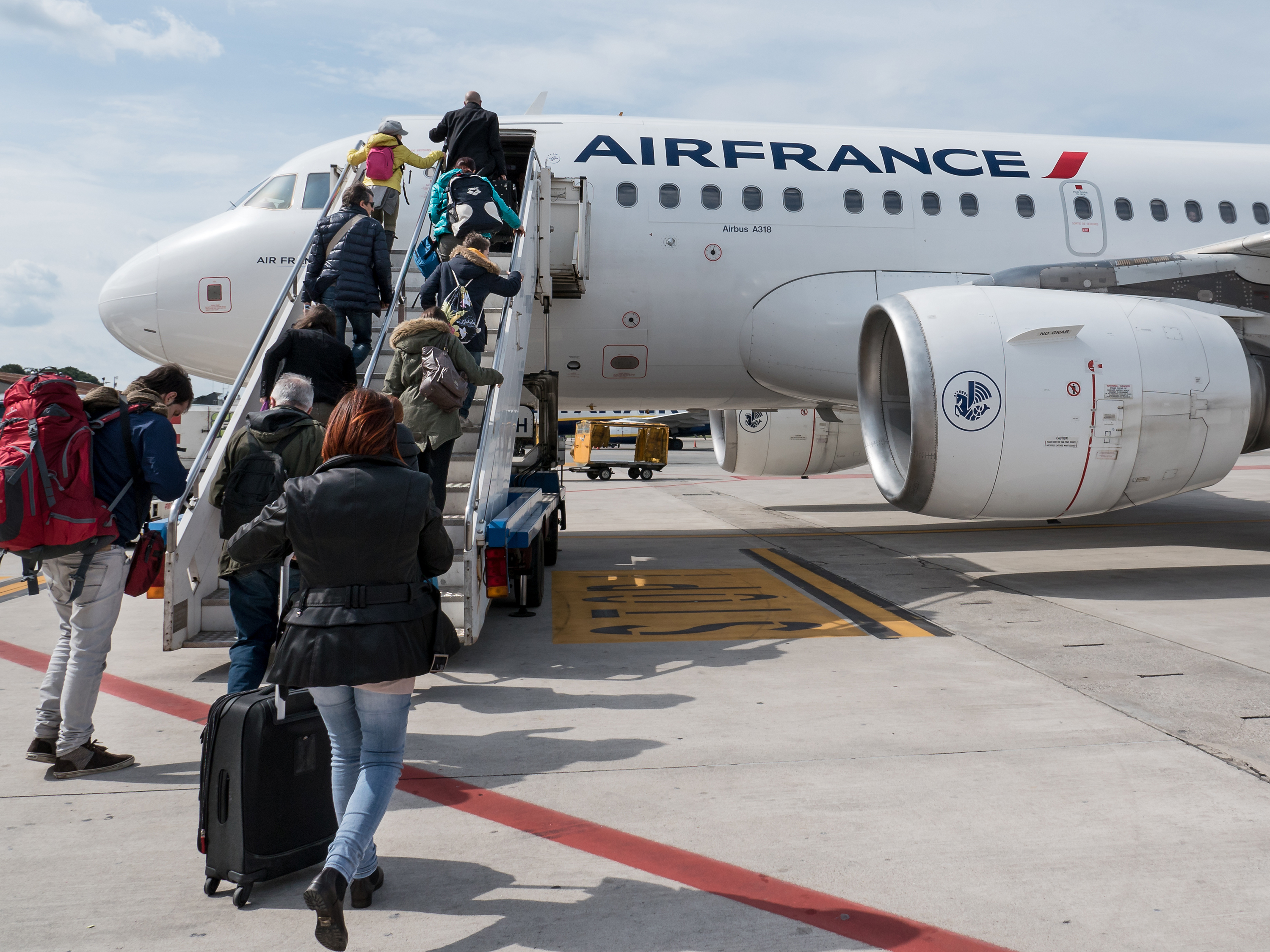 Passengers boarding an Air France plane