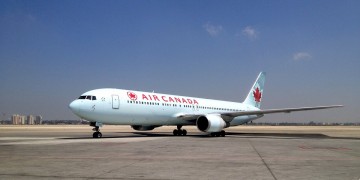 Air Canada employees throw luggage around